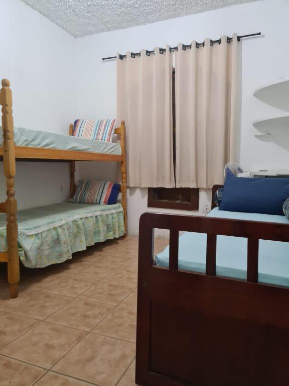 Imagem Casa com 4 Quartos para Temporada, 300 m²em Jardim Virgínia - Guarujá