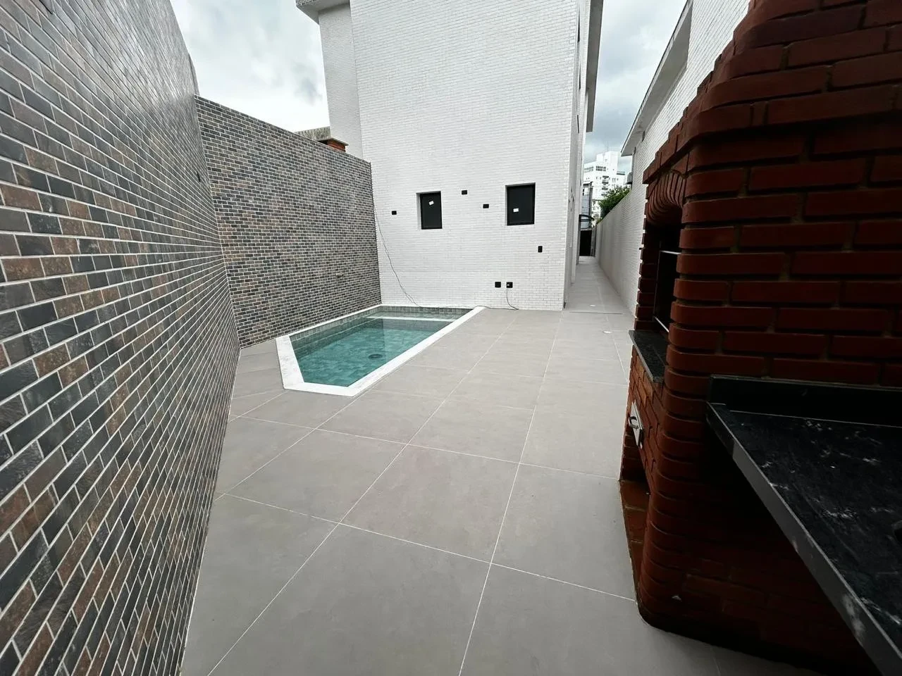 Imagem Casa com 3 Quartos à Venda, 100 m² em Aparecida - Santos