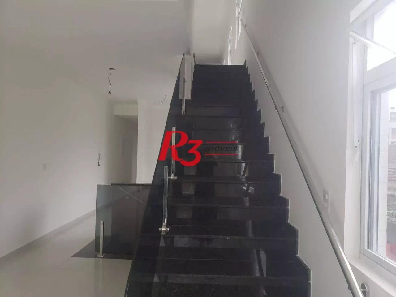 Imagem Casa de Vila com 3 Quartos à Venda, 155 m² em Embaré - Santos
