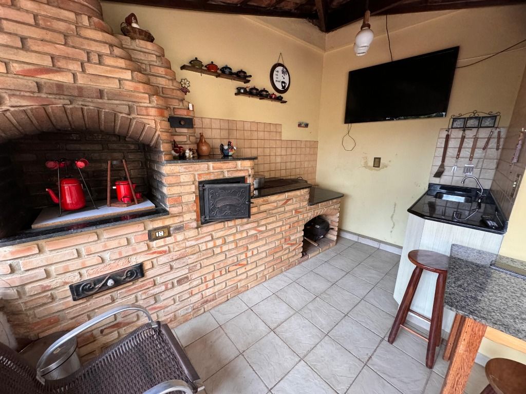 Imagem Casa com 4 Quartos à Venda, 249 m² em Tijuca - Contagem