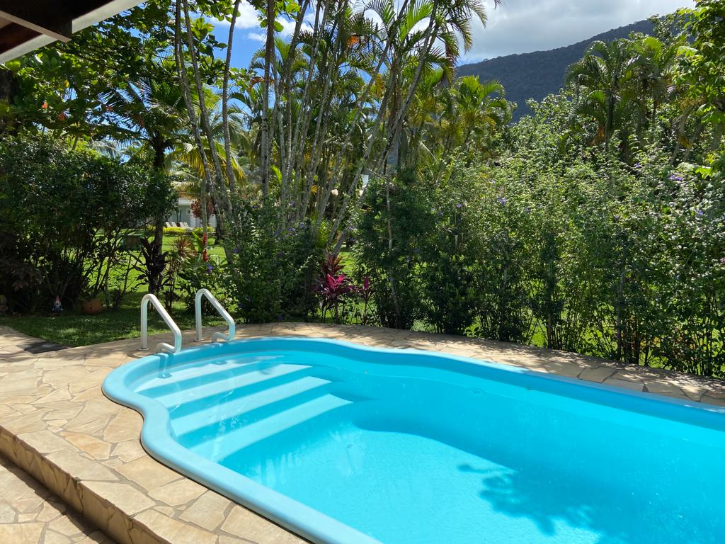 Imagem Casa de Condomínio com 4 Quartos à Venda, 300 m²em Praia das Palmeiras - Caraguatatuba