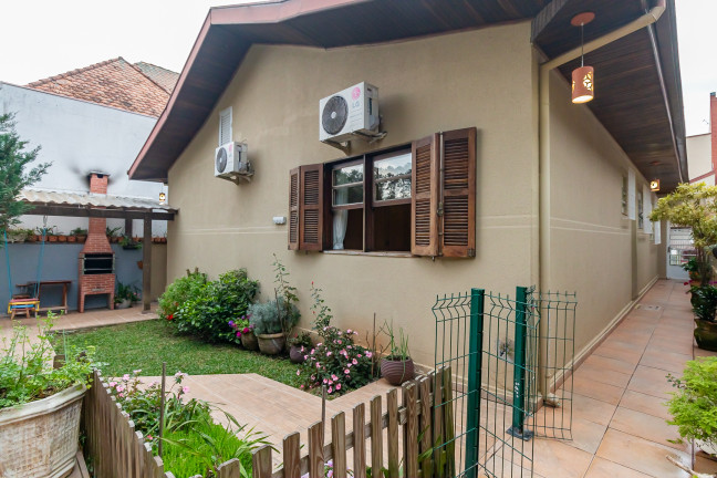 Imagem Casa com 3 Quartos à Venda, 182 m² em Bacacheri - Curitiba