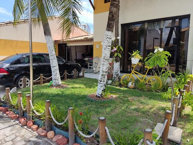 Imagem Casa de Condomínio com 4 Quartos à Venda, 284 m²em Buraquinho - Lauro de Freitas