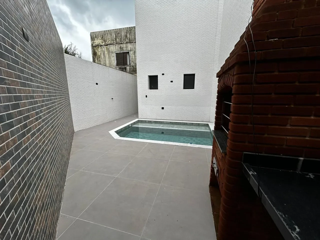 Imagem Casa com 3 Quartos à Venda, 100 m² em Aparecida - Santos