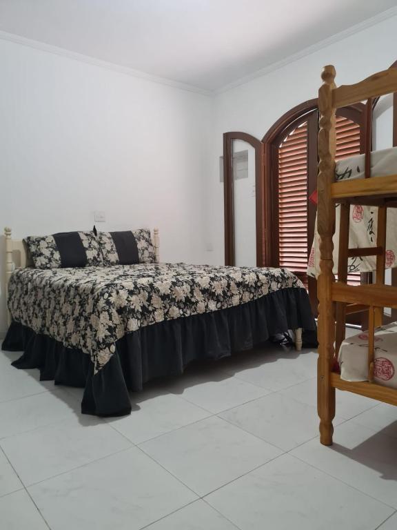 Imagem Casa com 4 Quartos para Temporada, 300 m²em Jardim Virgínia - Guarujá
