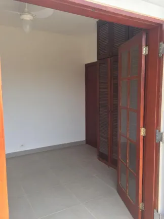 Imagem Casa de Condomínio com 3 Quartos à Venda, 270 m² em Boungainvillé II - Peruíbe