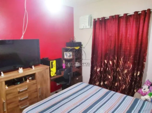 Imagem Casa Geminada à Venda em Tude Bastos, Praia Grande - 2 Quartos e Churrasqueira