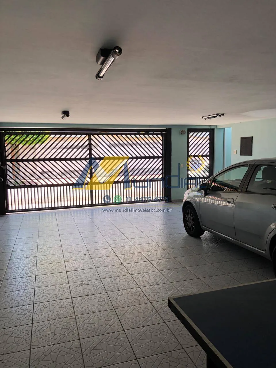 Imagem Sobrado amplo com 3 suítes, renda garantida e 6 vagas cobertas