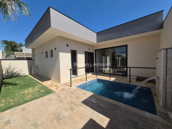 Imagem Casa moderna e sofisticada à venda em condomínio com segurança 24 horas, ideal para quem busca co...