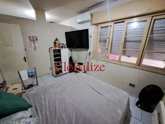 Imagem Apartamento à venda com 61m², 2 quartos, 1 banheiro, elevador e portaria por R$266.000,00 no José Menino em Santos.