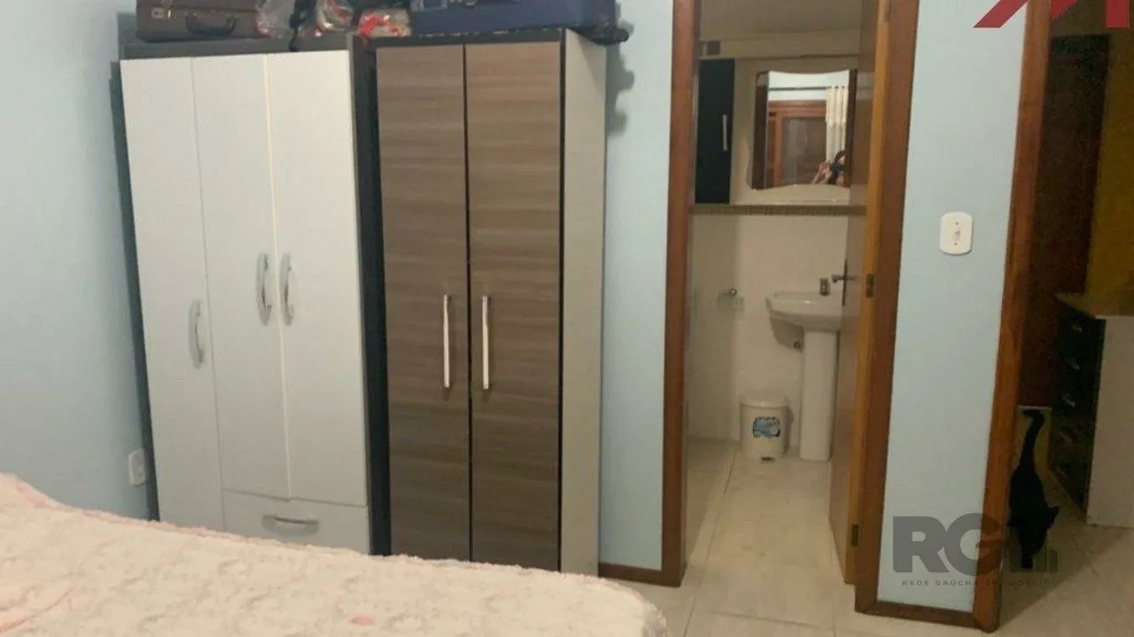 Imagem Sobrado em Trmandai com 2 suirtes, 2 banheiros, 1 vaga, churrasqueira e varanda.