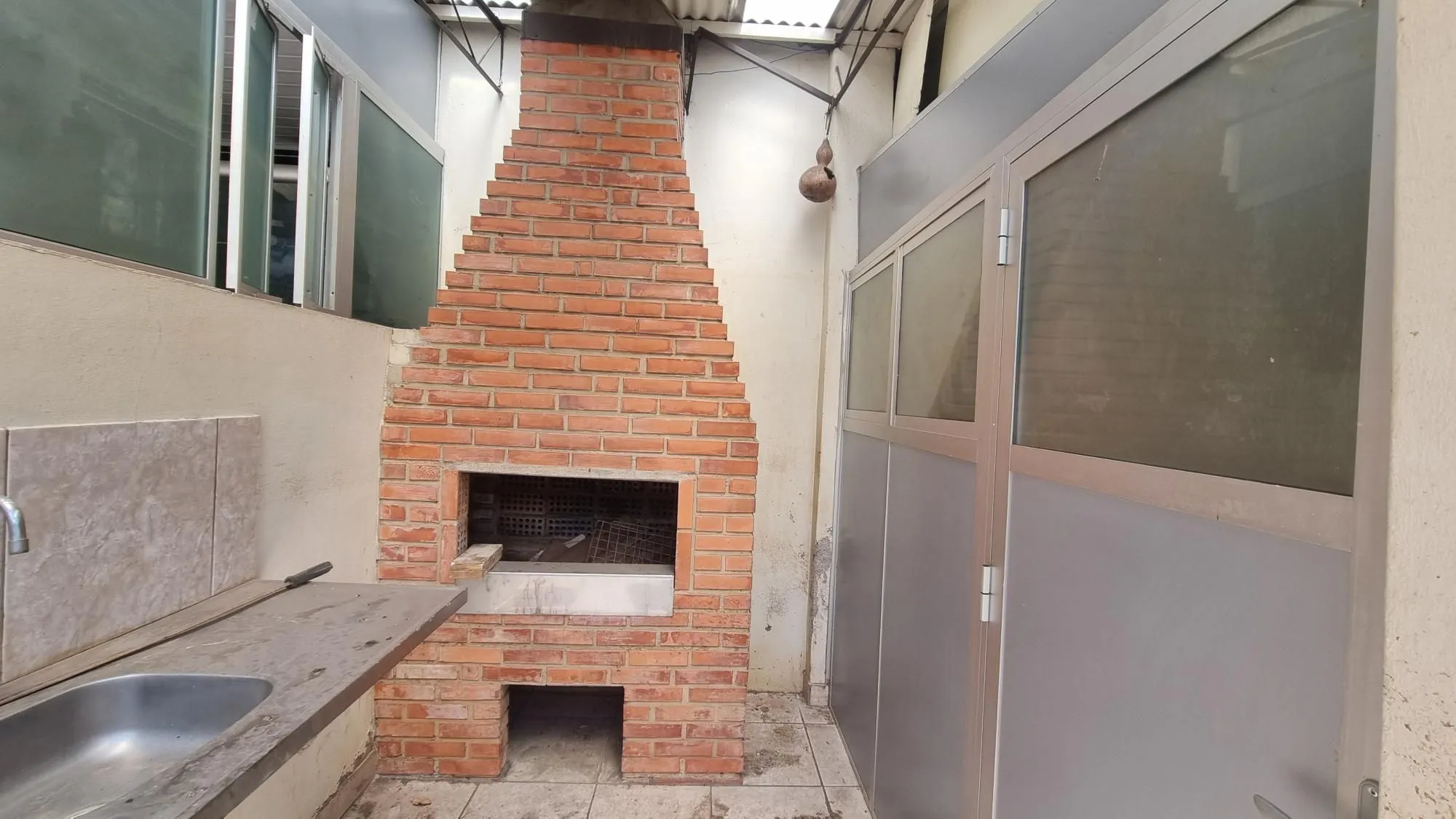 Imagem Casa com loja na frente a venda no Bairro Anchieta.