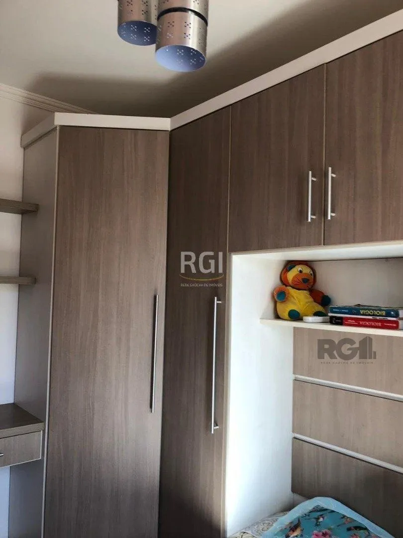 Imagem Casa residencial de 3 dormitórios sendo um uma suíte localizada no bairro Guarujá.
