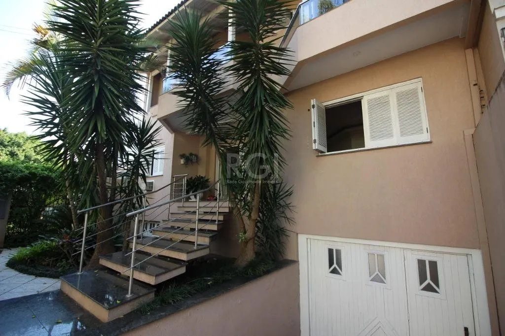 Imagem Casa para comprar com 4 dormitórios, 330m² - Chácara das Pedras - Porto Alegre