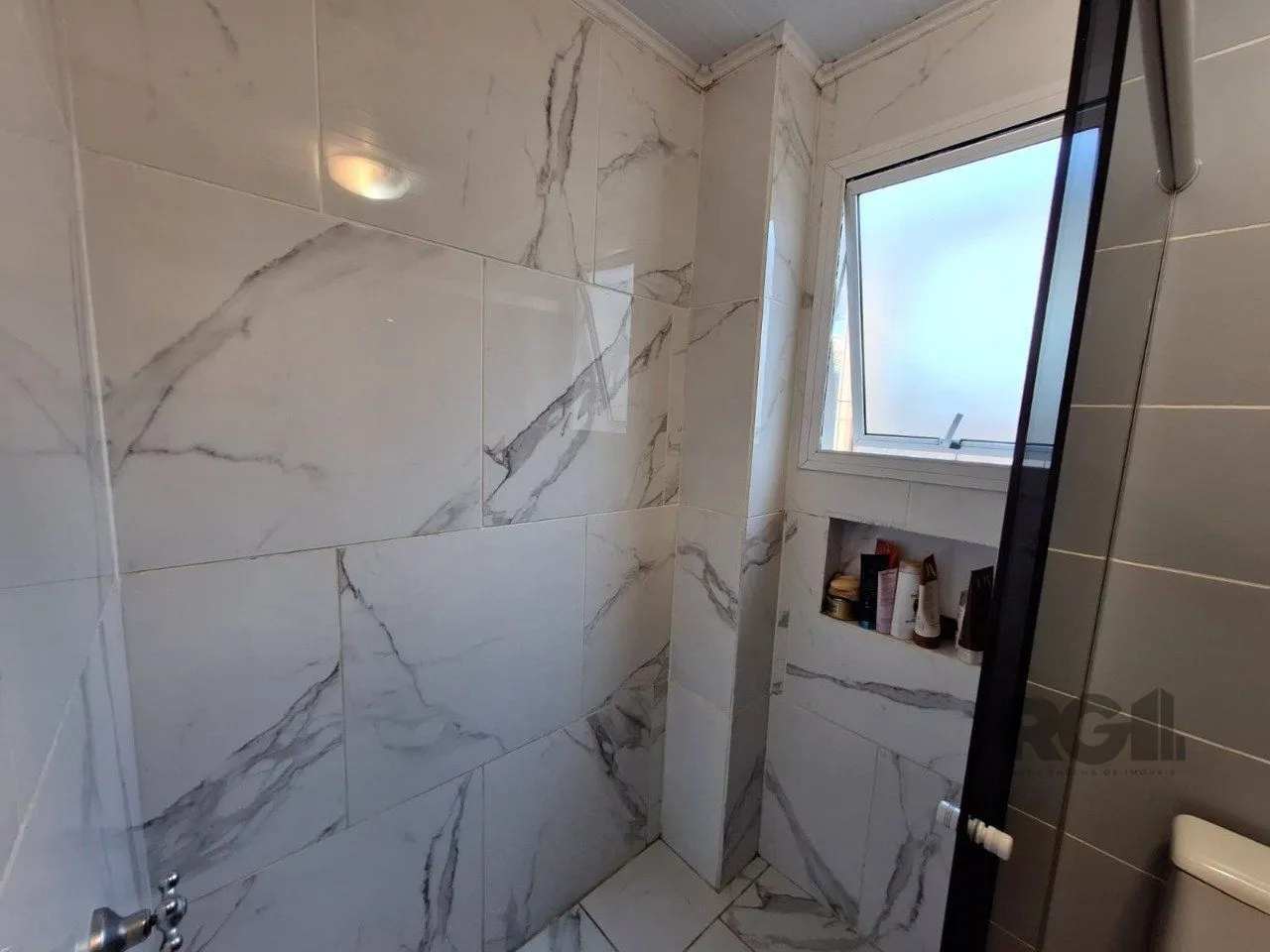 Imagem Casa com 3 dormitórios, suíte, lareira, Jardim Algarve em Alvorada - RS.