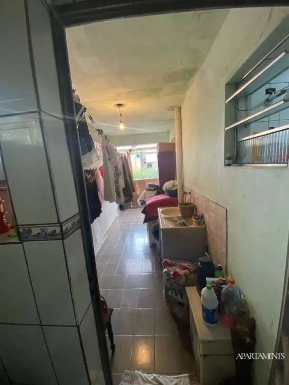 Imagem Terreno com 3 Casas com 3 vagas de carro e moto.