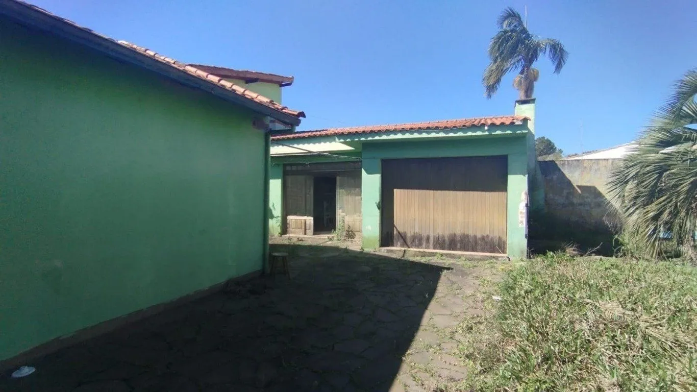 Imagem Casa com 4 quartos e 257m² à venda em Guarujá, Porto Alegre.