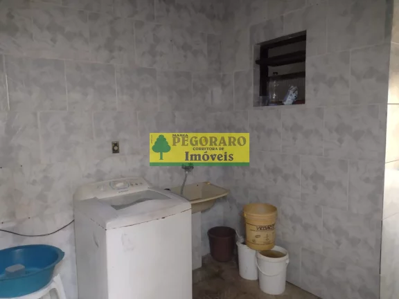 Imagem Casa à venda em Caraguatatuba-SP, bairro Rio do Ouro: 2 quartos, 2 salas, 2 banheiros, 2 vagas de garagem, 127m² - com piscina e churrasqueira!