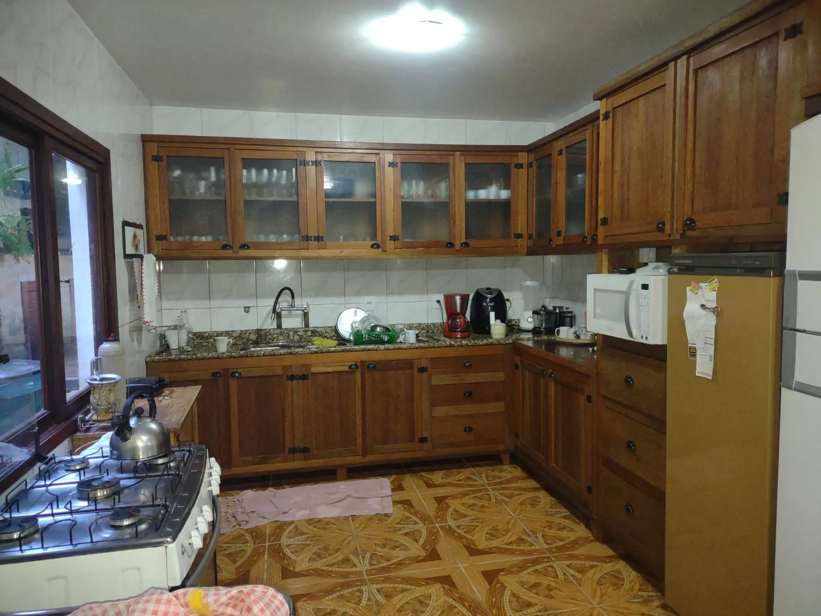 Imagem Casa com 4 quartos, suíte, piscina, lareira, churrasqueira em um terreno de 616m².