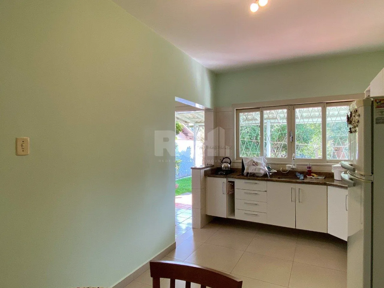 Imagem Casa com 4 dormitórios, no bairro Nossa Senhora das Graças em Canoas/RS