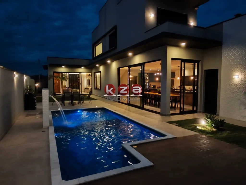 Imagem Casa a venda em Condomínio de Alto Padrão em Vinhedo-SP: 3 Suítes, 2 Salas, gourmet com churrasqueira e piscina.