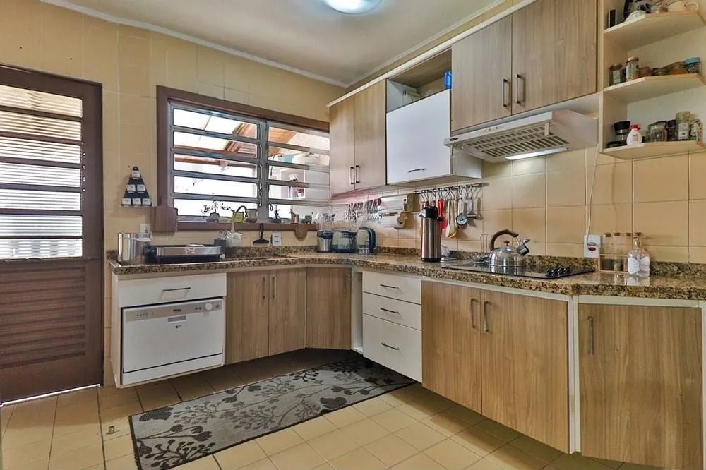 Imagem Casa térrea com 2 dormitórios, lavabo, espaço gourmet e 2 vagas.
