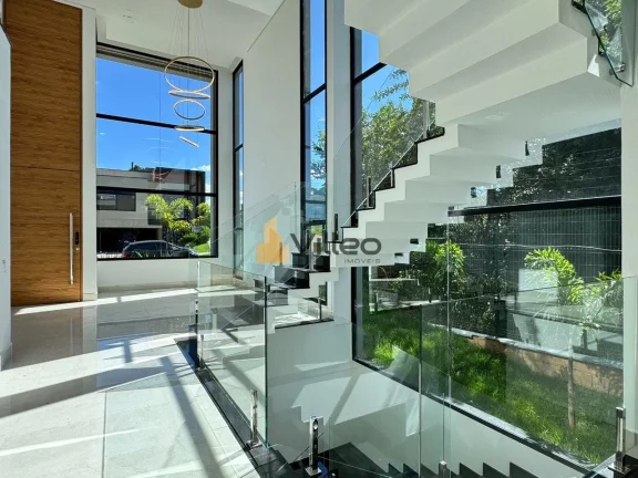 Imagem Imagine-se chegando em casa e sendo envolvido por um jardim exuberante e cuidadosamente planejado, o...