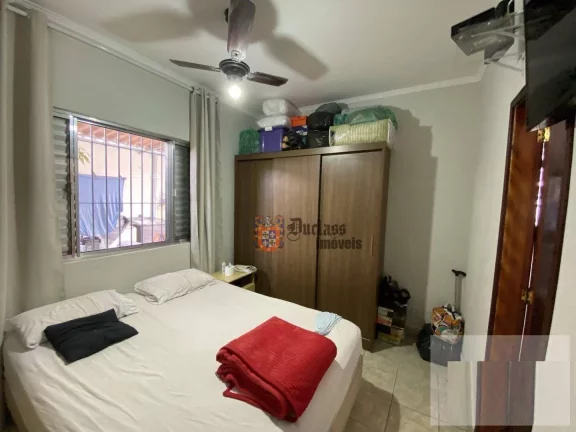 Imagem Casa com 3 dormitórios à venda, 100 m² por R$ 590.000 - Ocian - Praia Grande/SP