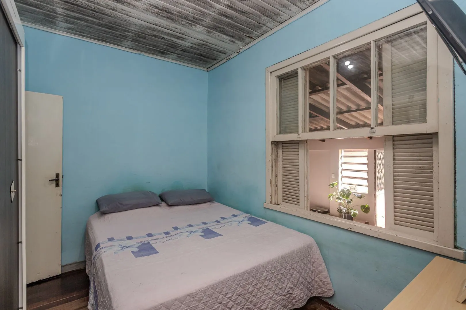 Imagem Casa no bairro Jardim Botânico de 3 dormitórios e garagem e terreno com 370m²