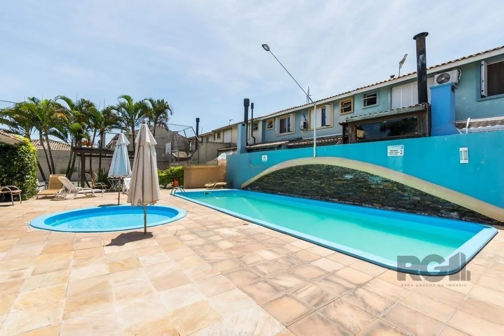 Imagem Casa em condomínio fechado - 70m², 2 dormitórios, 1 vaga de garagem no bairro Humaitá