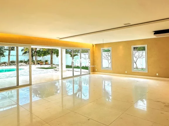 Imagem Paraíso em Malibu: Uma Residência Excepcional na Barra da Tijuca, Rio de Janeiro-RJ: 4 suítes, 3 vagas, 1.000 m² de área.