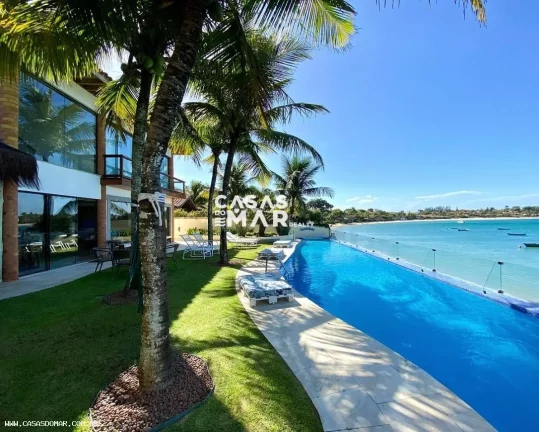 Imagem Imperdível casa frente mar à venda em Búzios-RJ, bairro Ferradura: 6 quartos, 6 suítes, 3 salas, 9 banheiros, 7 vagas, 880m².