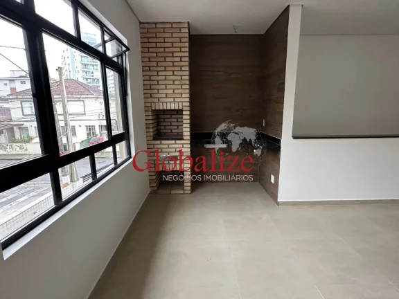 Imagem Casa Sobreposta alta à venda com 80m², 2 suítes, churrasqueira, 1 vaga por R$695.000,00 na Vila Belmiro em Santos