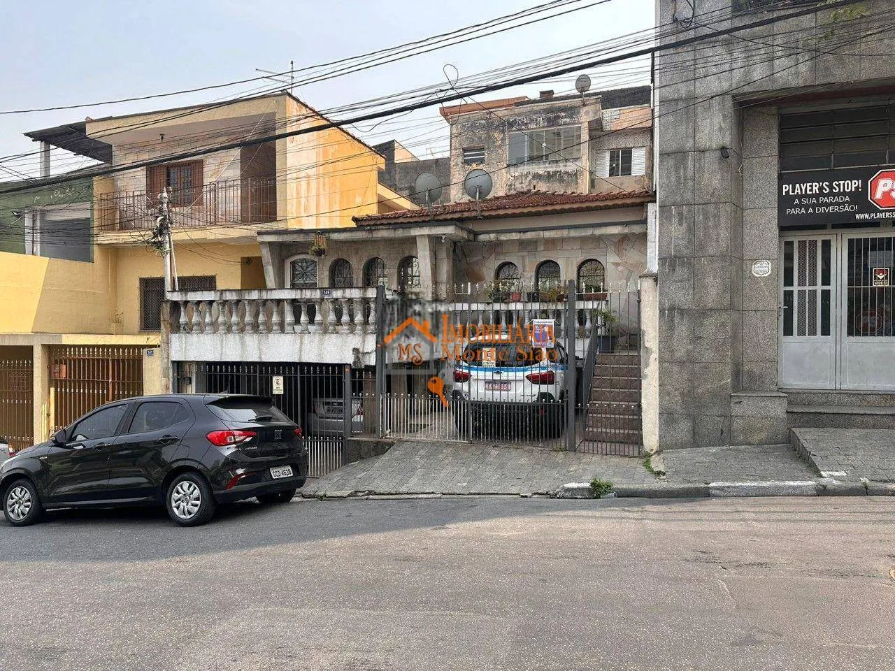 Foto do imóvel Sobrado com 6 dormitórios à venda por R$ 1.150.000,00 - Camargos - Guarulhos/SP
