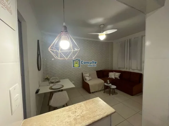 Imagem "Viva a experiência de morar pertinho da areia, em um apartamento aconchegante de 1 dormitório, porteira fechada, situado a poucos passos da praia, com uma vista lateral encantadora do mar que torna cada dia mais especial." Por apenas R$ 270.000,00. Agend