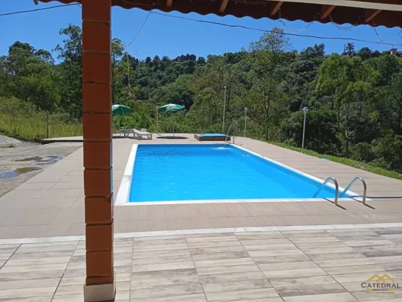 Imagem Chácara à venda com 3 quartos, piscina e área gourmet em Campo Limpo Paulista.