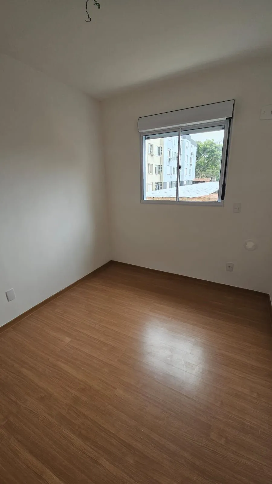 Imagem Apartamento 2 dormitórios , suíte , sacada com churrasqueira , 1 vaga de garagem coberta !