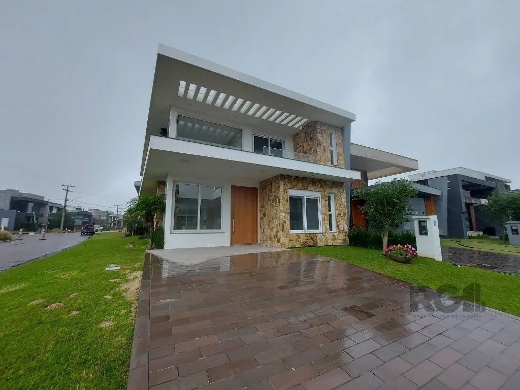 Casa de Condomínio em Atlântida Sul