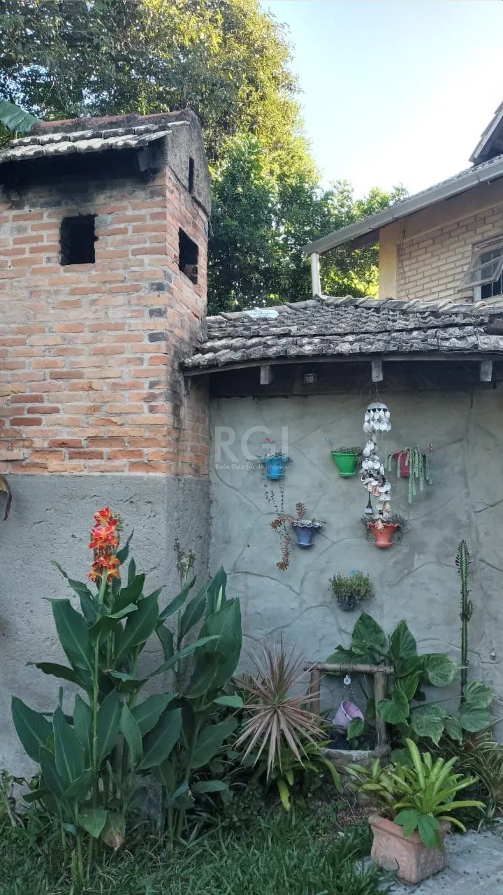 Imagem Casa com 3 dormitórios no bairro Olaria em Canoas