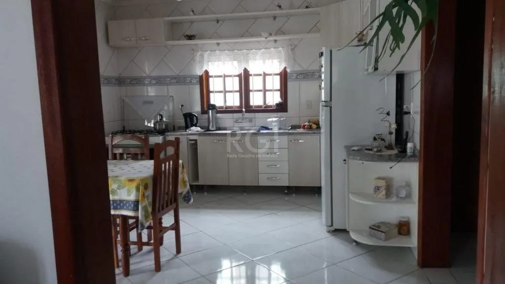 Imagem Casa com 3 dormitórios à venda, 230,11 m² por R$ 900.000,00 - Igara III - Canoas/RS