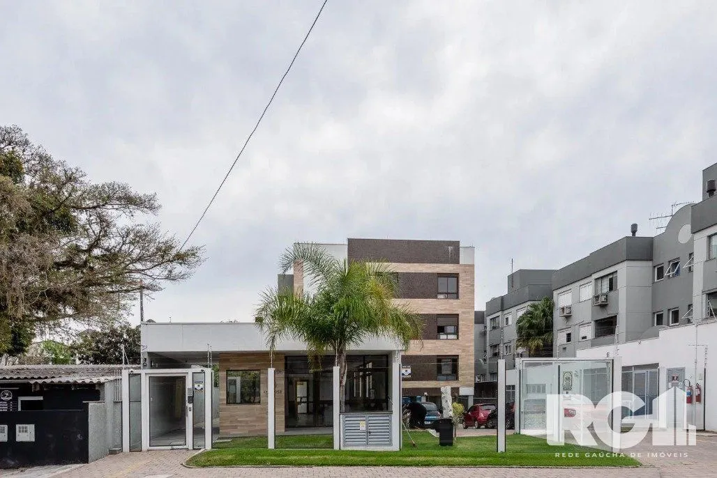 Imagem Apartamento de 3 dormitórios com suíte e churrasqueira, lavabo e 2 vagas de garagem.