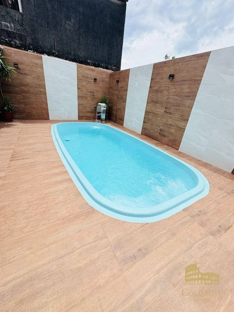 Imagem Casa com 3 dormitórios à venda por R$ 770.000,00 - Jardim Anhangüera - Praia Grande/SP