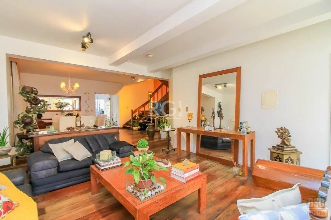 Imagem casa Living para 3 ambientes com lavabo, cozinha com pia e armários planejados