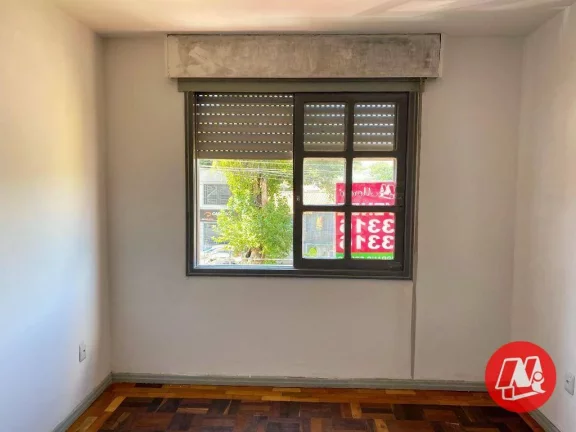 Imagem No bairro Medianeira,1 dormitório e sacada.