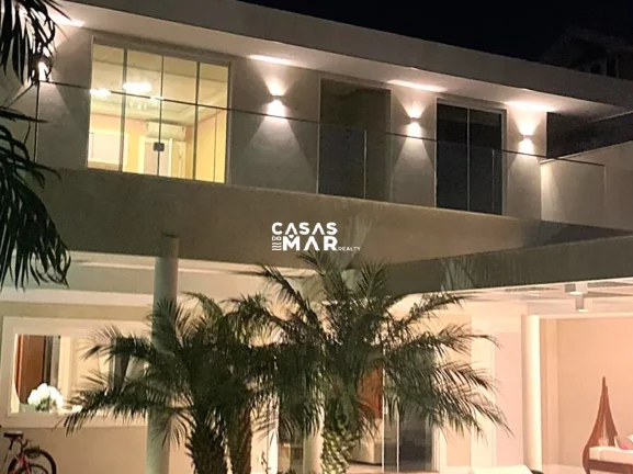 Imagem Imponente mansão de luxo na Barra da Tijúca: 5 quartos, 4 suítes, 3 salas, 7 banheiros, 2 vagas de garagem, 920m² de área. Venda!