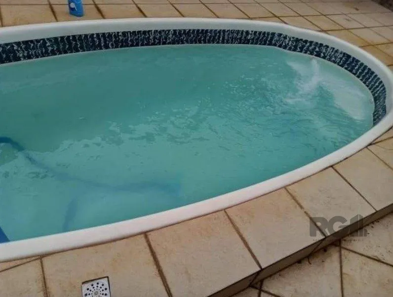 Imagem Casa 179m², 3 dormitórios, 3 vagas no bairro Parque Santa Fé