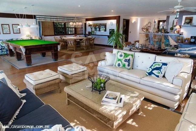 Imagem Imóvel de luxo em condomínio à beira-mar em Búzios-RJ: 5 quartos, 5 suítes, 8 banheiros, 3 vagas, 650m² de área. Venha conferir!