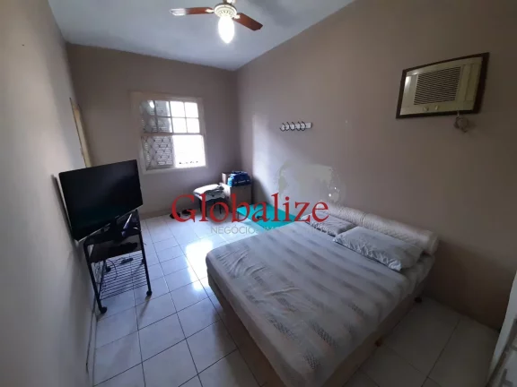 Imagem Casa com 3 dormitórios e 2 vagas à venda no Macuco em Santos R$ 900.000,00