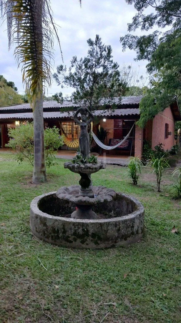 Imagem Sitio à venda no Lami, com 2 casas térreas, com 4 quartos cada uma