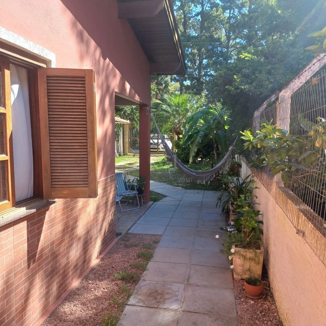 Imagem 2 Casa com 4 quartos, 2 vagas de garagem, no bairro Belém Novo, Porto Alegre/RS